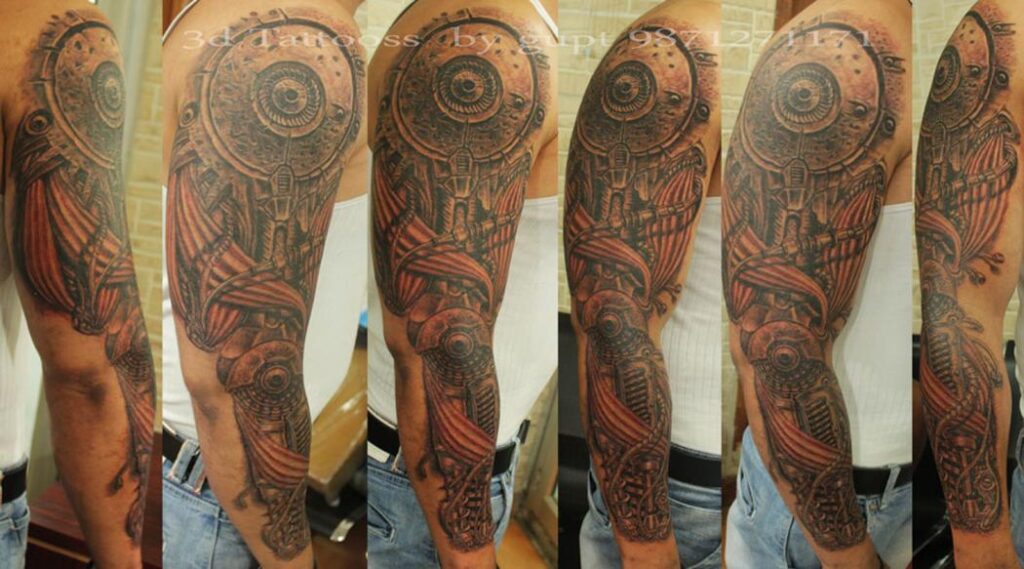 biomechanical tattoo on full arm by tattoo artist gupt ram gupt ram