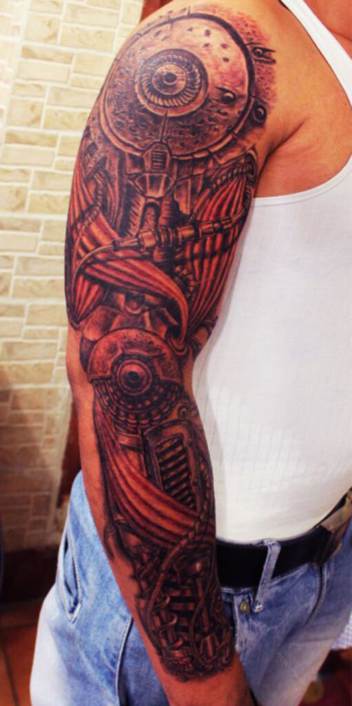 biomechanical tattoo on full arm