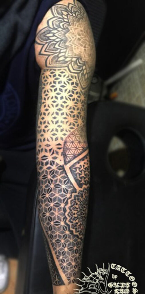 geometric tattoo on full arm